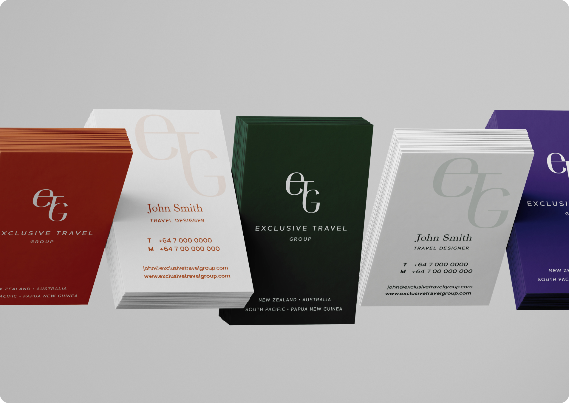 Multiple colours of business cards highlight the brand colours.